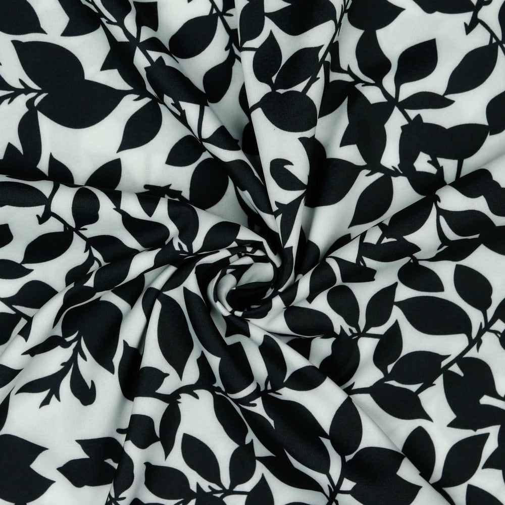 Dress fabric with elastane - black and white leaf pattern 80 g/m²