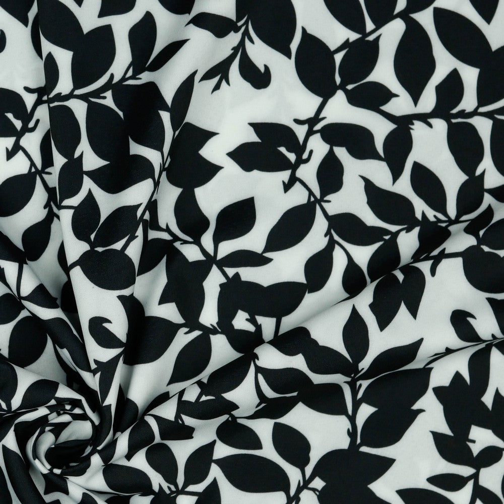 Dress fabric with elastane - black and white leaf pattern 80 g/m²