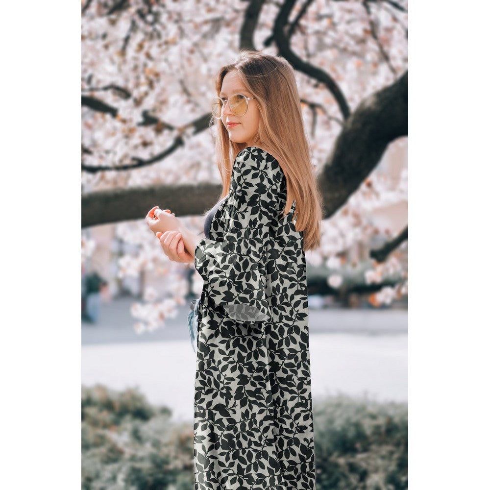 Dress fabric with elastane - black and white leaf pattern 80 g/m²