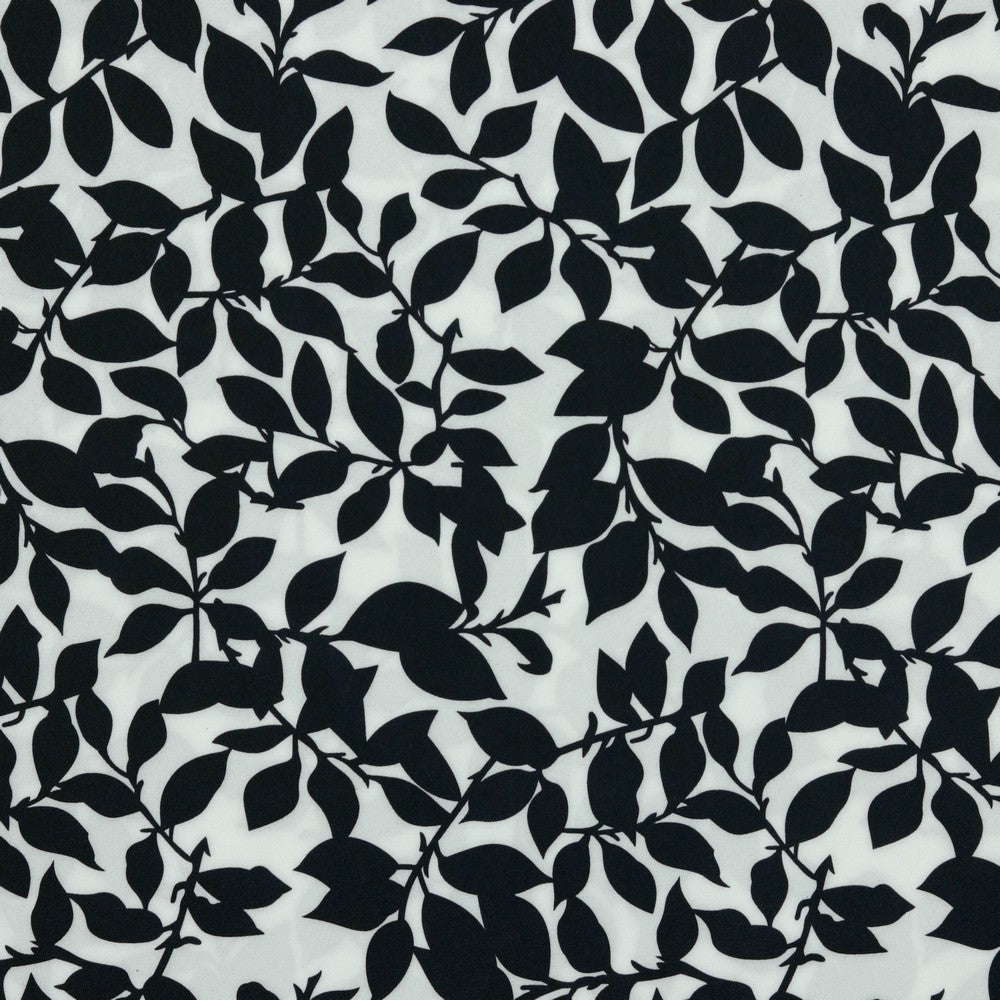 Dress fabric with elastane - black and white leaf pattern 80 g/m²