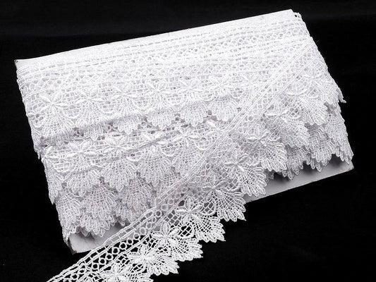 Attēls ar Dekoratīva mežģīņu lente 55 mm - melna – pieejams Šarlotes audumi