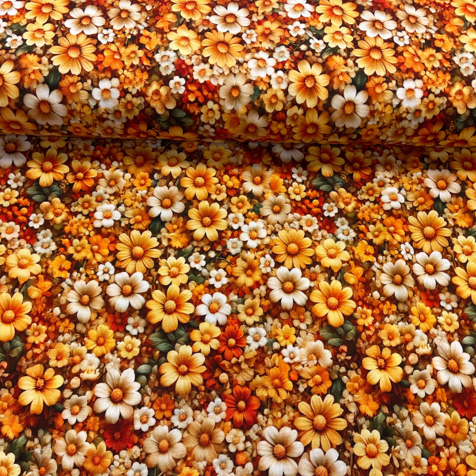 Kokvilnas trikotāža - dzelteni ziedi 200 g/m²