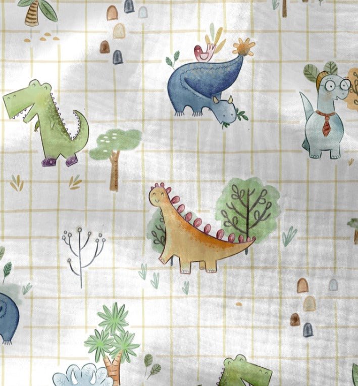 Attēls ar Muslīns - dinozauri rūtiņās 120 g/m² – pieejams Šarlotes audumi