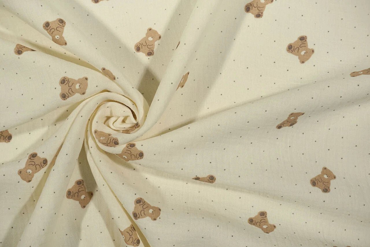 Muslīns - lācīši uz sviesta dzeltena fona 125 g/m²