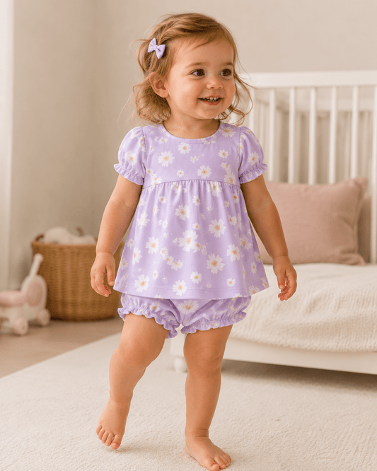 Image of a swimsuit in lycra fabric with UPF50 protection – flowers on lilac 200 g/m² – available at Šarlotes audumi