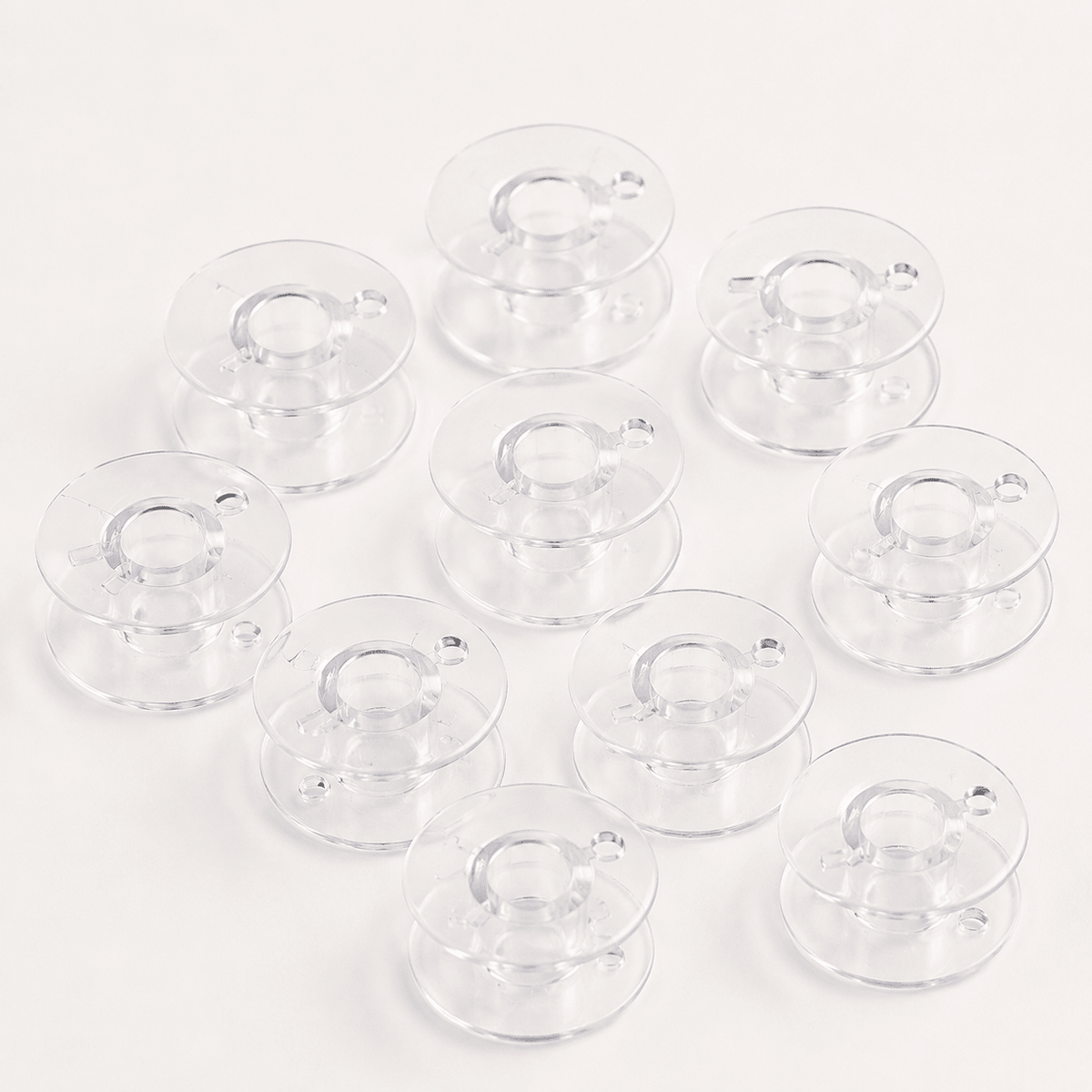 Pilt plastpool lameda õmblusmasinatele Ø 20,4 mm – 10 tk komplekt – saadaval veebis Šarlote audud