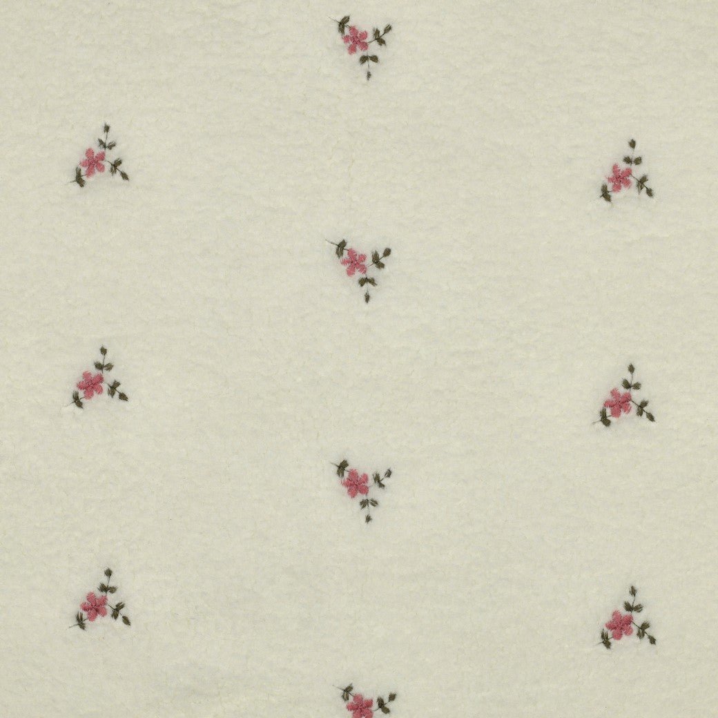 Teddy fleece in warm white with embroidery – available online at Šarlotes audumi