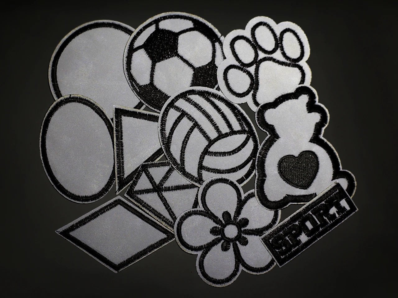 Attēls ar Uzgludināmie atstarotāji, aplikācijas | dažādas formas un izmēri – pieejams Šarlotes audumi