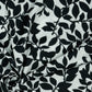 Dress fabric with elastane - black and white leaf pattern 80 g/m²