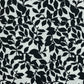 Dress fabric with elastane - black and white leaf pattern 80 g/m²