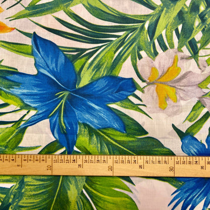 Tissu 100 % coton - fleurs tropicales bleues sur fond orange 125 g/m