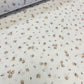 100% Kokvilnas audums - smalkas brūnas rozītes 125 g/m²