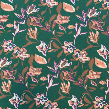 100% Viscose fabric - abstract floral pattern on a green background 125 g/m²