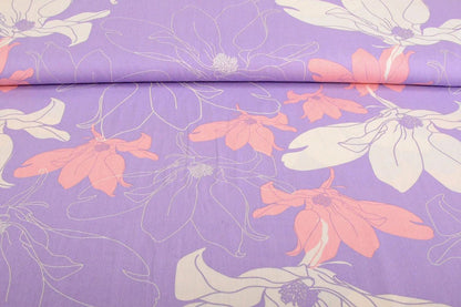 Tissu 100 % viscose - fleurs sur fond lilas 105 g/m²
