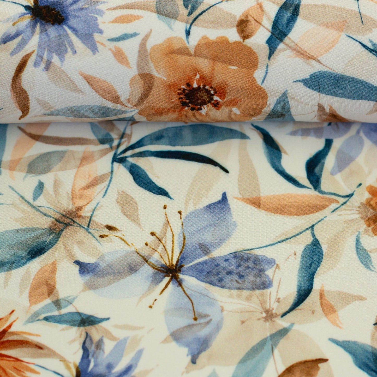 100% viscose fabric with blue and orange floral pattern – available online at Charlotte Fabrics