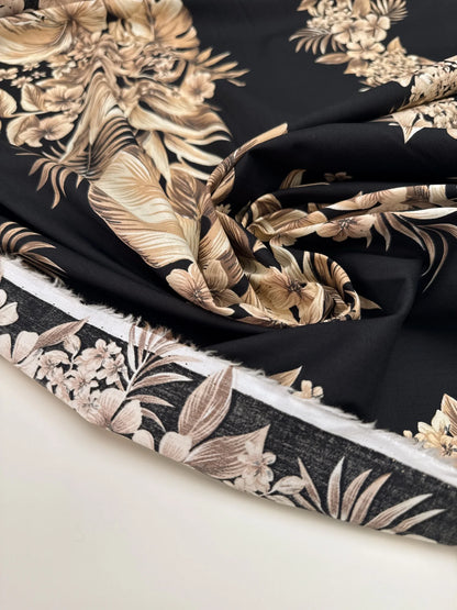 Italian cotton fabric with tropical floral pattern on a black background – 120 g/m²