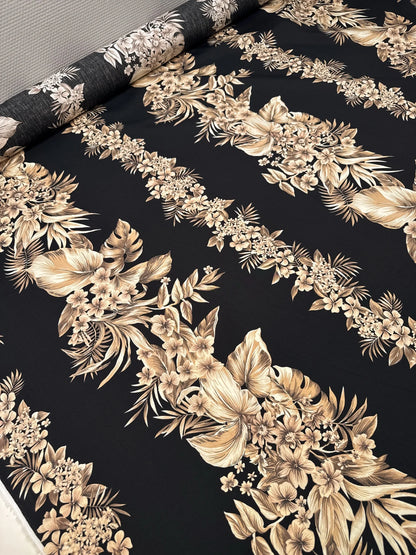 Italian cotton fabric with tropical floral pattern on a black background – 120 g/m²