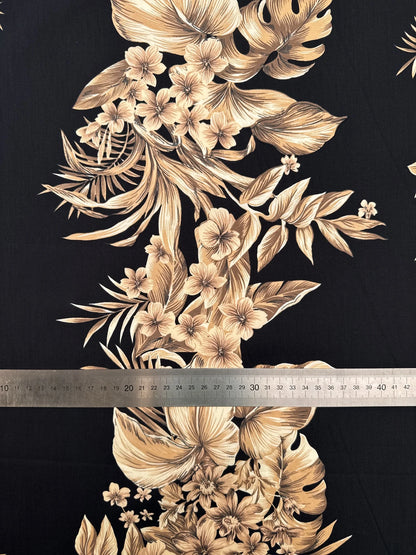 Italian cotton fabric with tropical floral pattern on a black background – 120 g/m²