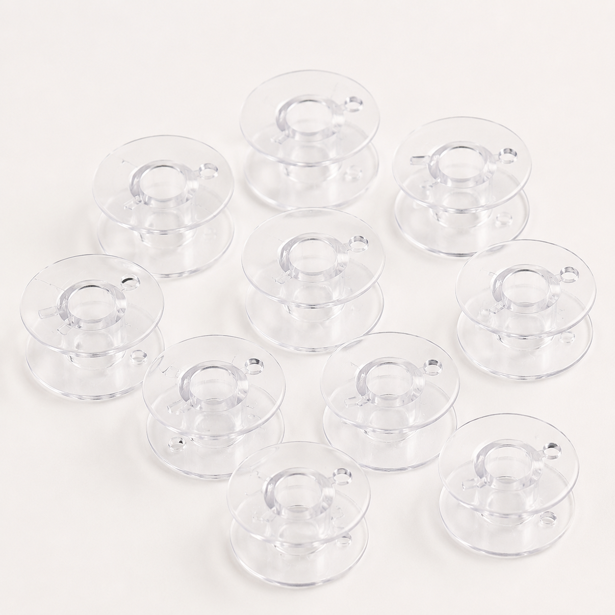 Plastmasas spolīte plakana šujmašīnām Ø 20,4 mm-komplekts 10 gab.