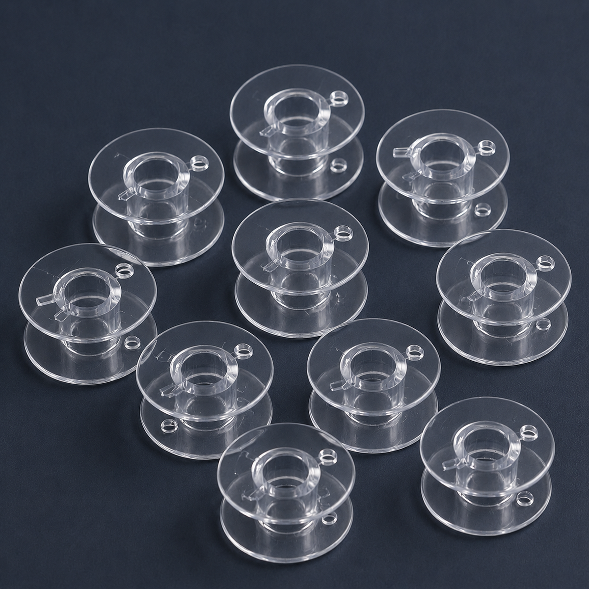 Plastmasas spolīte plakana šujmašīnām Ø 20,4 mm-komplekts 10 gab.