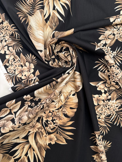 Italian cotton fabric with tropical floral pattern on a black background – 120 g/m²