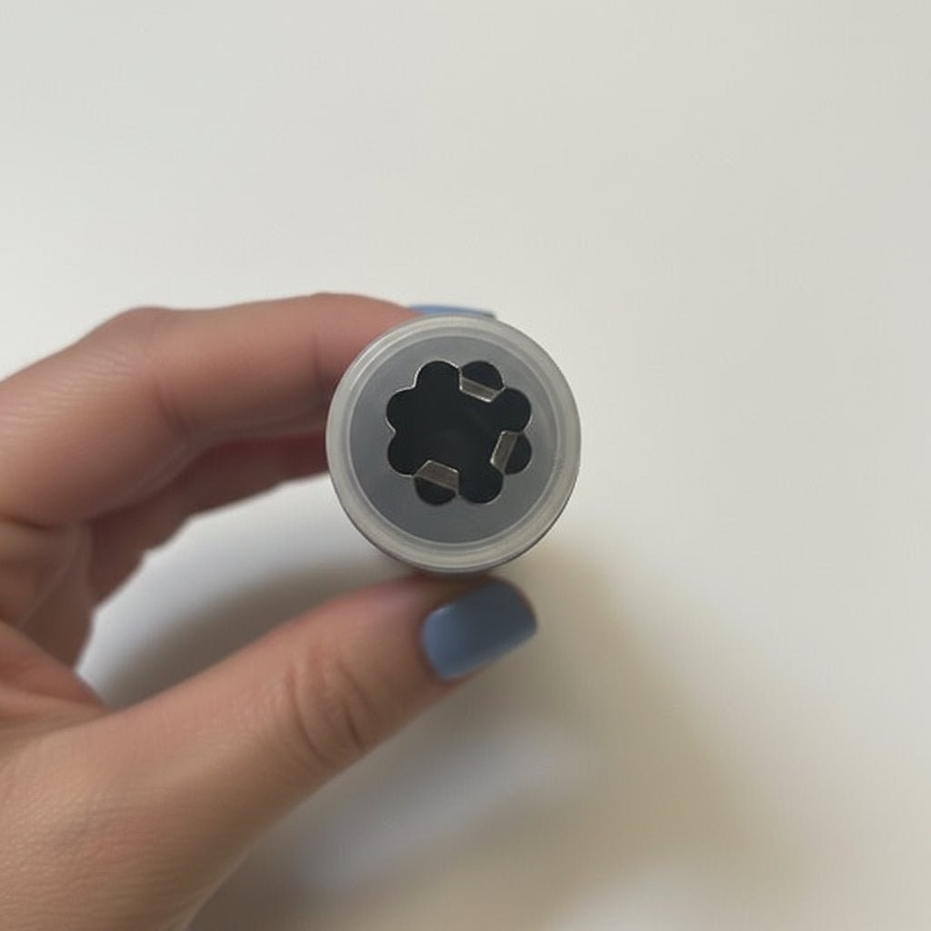 Image of decorative button 19 mm black flower – available online at Charlotte's Fabrics