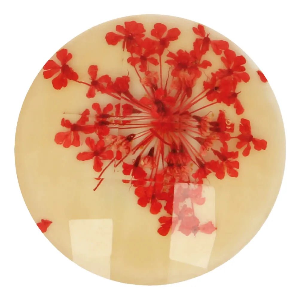 Image of a decorative button with a real dried flower in resin, 25 mm, red flower – available online at Šarlotes audumi