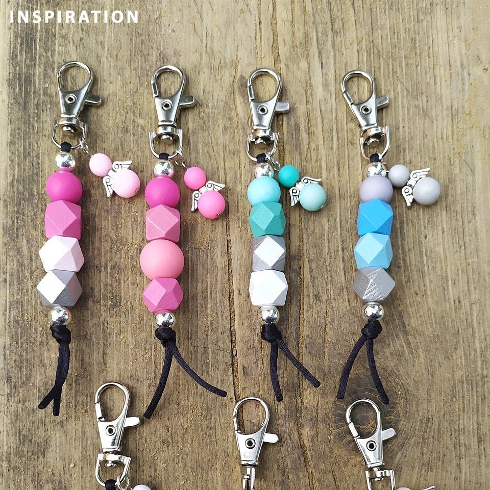 Attēls ar Dimanta formas koka pērlītes | 15×20 mm | 10 gb – pieejams Šarlotes audumi