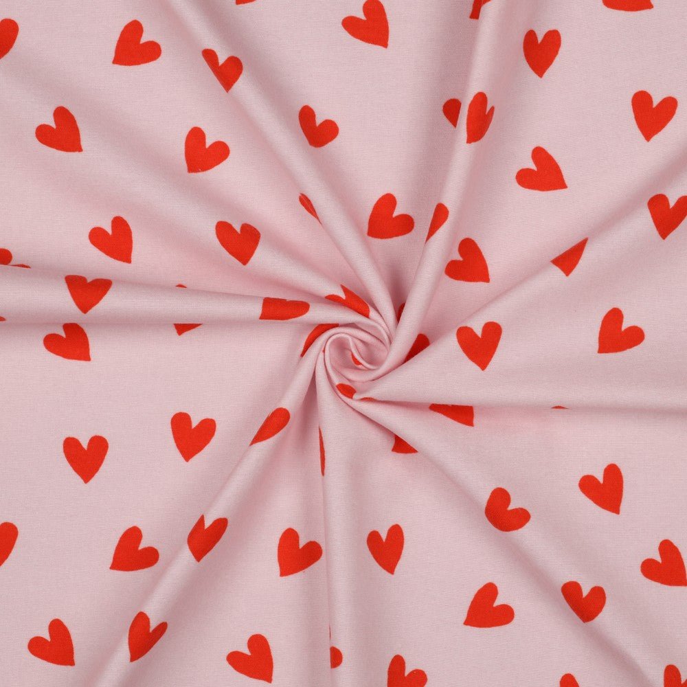Attēls ar Flanelis - sarkanas sirsniņas uz rozā 165 g/m² – pieejams Šarlotes audumi