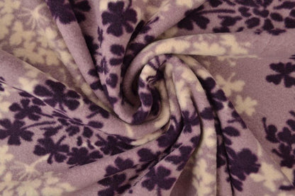 Image of fleece fabric with tree pattern – purple/beige – available online Šarlotes audumi