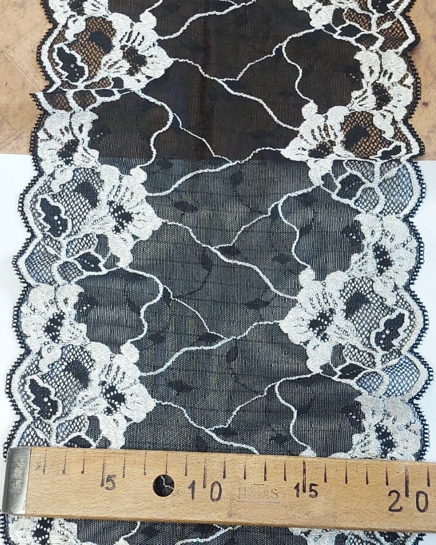 Embroidered lace 20 cm, black with white – available online at Šarlotes audumi