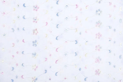 Tissu en coton brodé - broderie colorée 110 g/m²