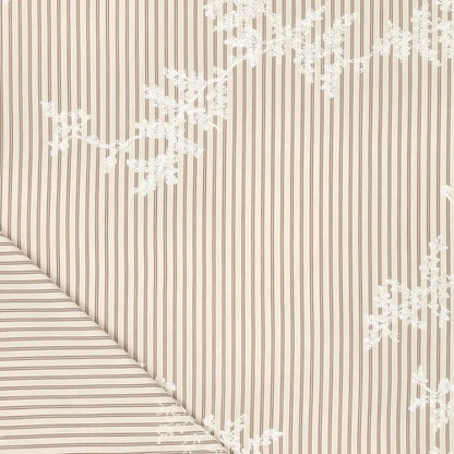 Image of embroidered cotton fabric with stripes and white embroidered flowers – available online at Charlotte's Fabrics