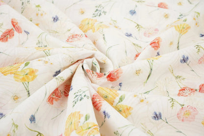Image of embroidered cotton fabric - summer flowers 115 g/m² – available at Šarlote Fabrics