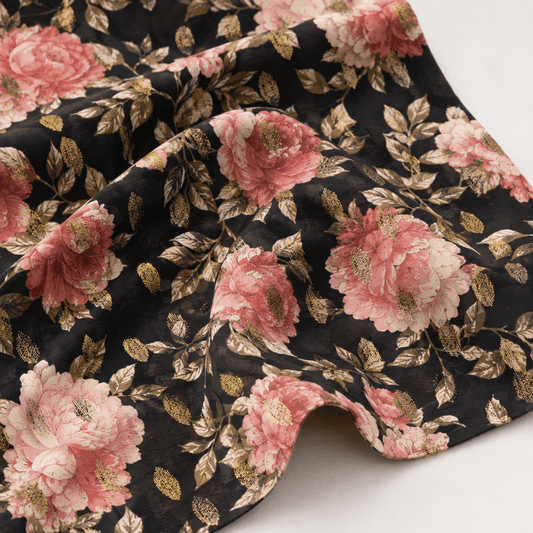 Image of dress fabric with gold accents and flowers on black – available online at Charlotte's Fabrics