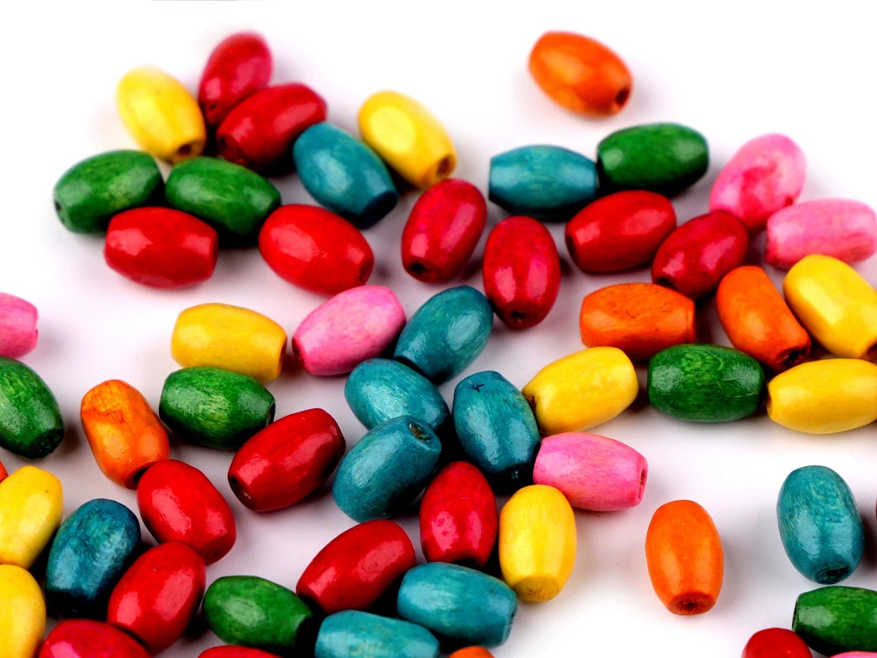 Attēls ar Koka pērlītes 5×8 mm (olīvas forma) 20 g – pieejams Šarlotes audumi