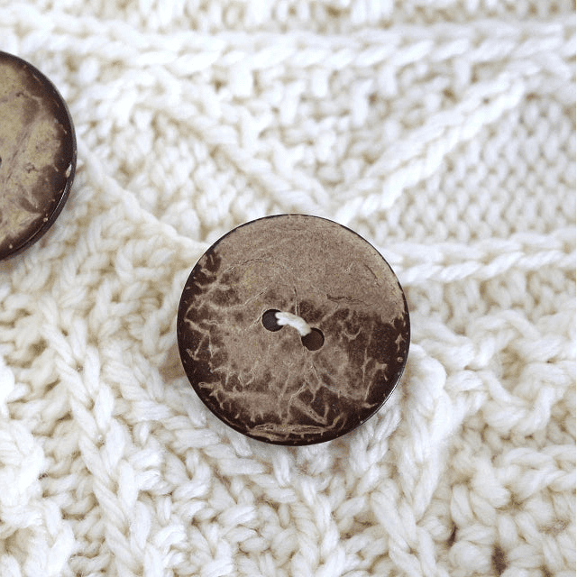 Image of 15 mm two-hole coconut button – available online at Charlotte's Fabrics