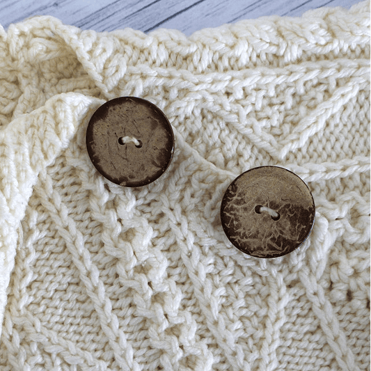 Coconut two-hole button 15 mm – available online at Charlotte Fabrics