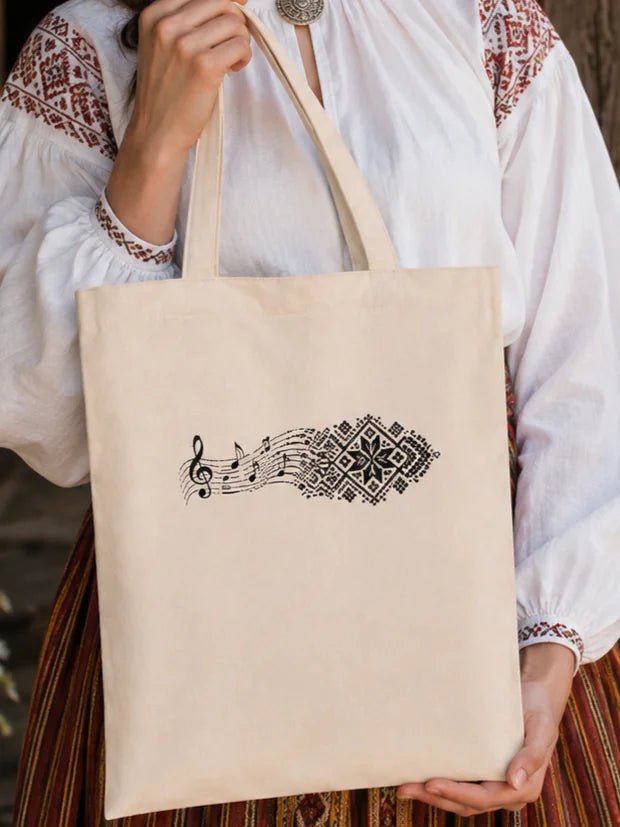 Image of a cotton fabric bag "Sheet music and Latvian pattern design" – available online at Šarlotes audumi