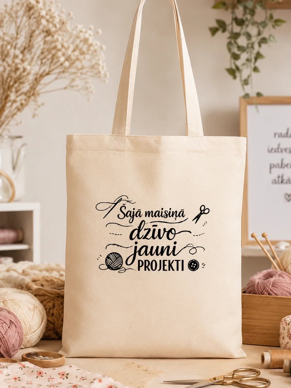 Cotton fabric bag with the text "New projects live in this bag" – available online at Šarlotes audumi