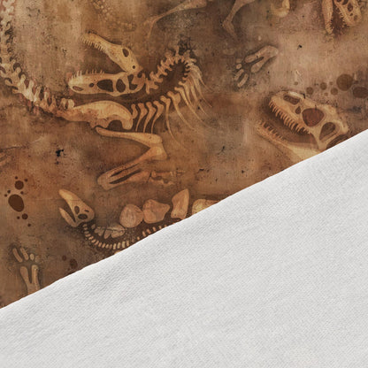 Pilt puuvillasest looptrikotaažist – dinosauruse fossiilid 250 g/m² – saadaval Šarlotes audumites