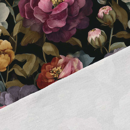 Image with cotton loop-back knit fabric—beautiful flowers on a black background, available online at Charlotte's Fabrics