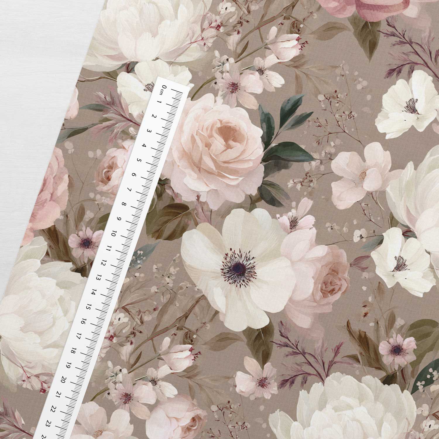 Cotton loopback knit fabric with romantic flowers on a brown background – available online at Charlotte's Fabrics