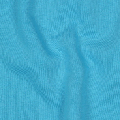 Cotton loop-knit fabric in turquoise blue – available online at Šarlotes audumi