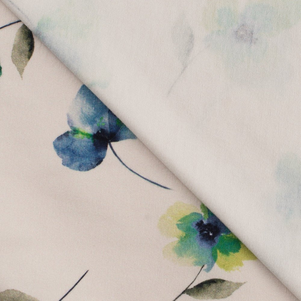 Cotton knit fabric with sky-blue flowers – available online at Šarlotes audumi