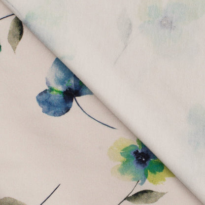 Cotton knit fabric with sky-blue flowers – available online at Šarlotes audumi