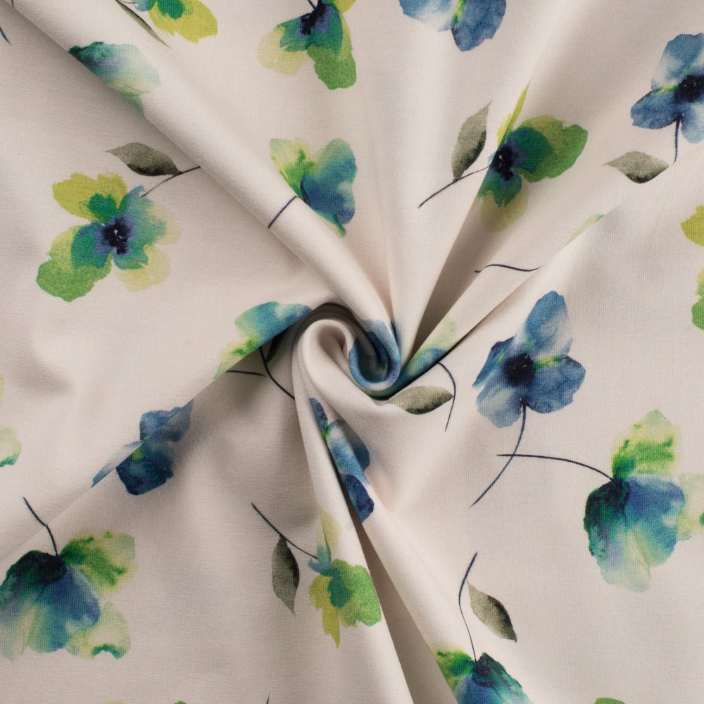 Image of cotton jersey with sky-blue flowers – available online at Šarlotes audumi