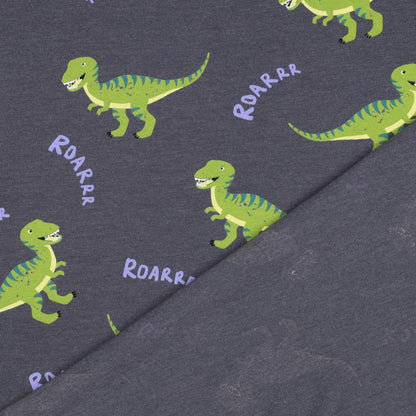 Puuvillane trikotaaž - dinosaurused hallil melange'il 200 g/m²