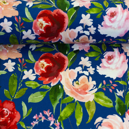 Cotton knit fabric - roses on a blue background 200 g/m²