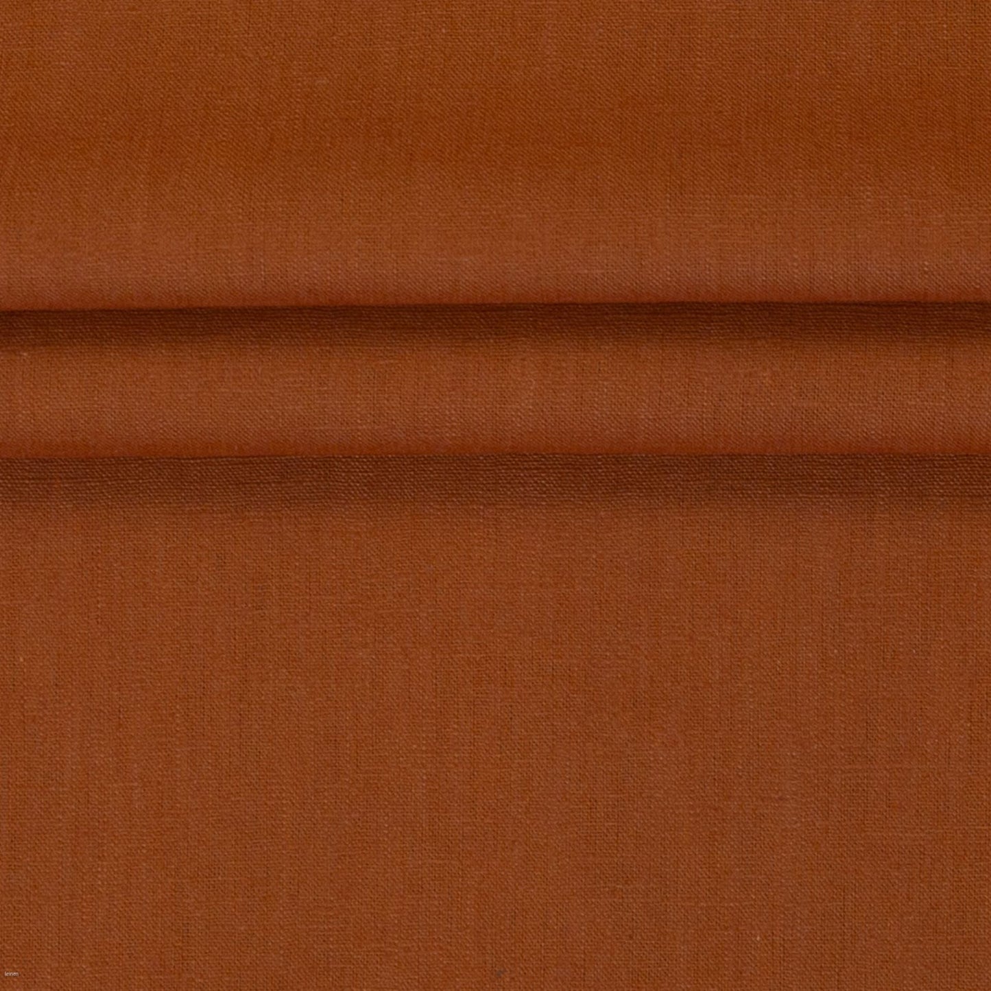 Image de tissu en lin – terre cuite 235 g/m² – disponible chez Šarlotes audumi